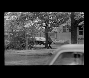 A man seen winding up to throw an object
