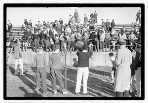 A crowd of boys on bleachers