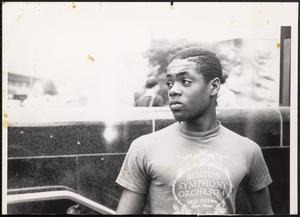 Young man in Boston Symphony Orchestra shirt