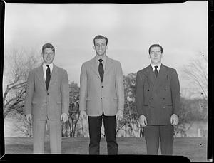 Three men in suits and ties
