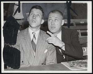 Paying Strict Attention is Jack Sharkey, Jr., at the recent Louis-Conn affair because that's Daddy Jack, a former world heavyweight champion, giving his son a few tips during the preliminaries.