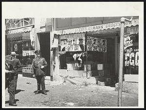 A surging mass of men wrecked a grocery store at 23rd and Mission streets, San Francisco, as the general strike went into effect. The store was raided twice and $2000 worth of groceries were stolen.