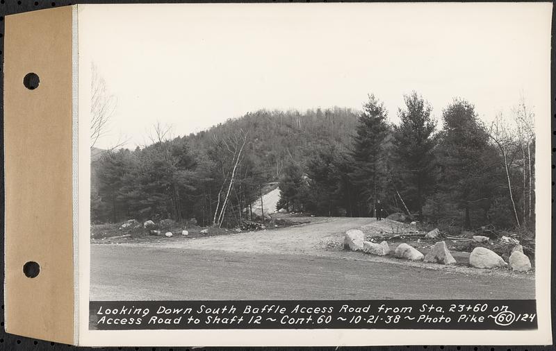 Contract No. 60, Access Roads to Shaft 12, Quabbin Aqueduct, Hardwick and Greenwich, looking down South Baffle access road from Sta. 23+60 on access road to Shaft 12, Greenwich and Hardwick, Mass., Oct. 21, 1938