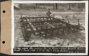 Contract No. 106, Improvement of Access Roads, Middle and East Branch Regulating Dams, and Quabbin Reservoir Area, Hardwick, Petersham, New Salem, Belchertown, drag used for mixing tar in place, East Branch access road, Belchertown, Mass., Jul. 18, 1940