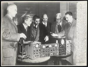 Inspect National Atomic Laboratory -- Members of the executive committee examine equipment at the Brookhaven National Laboratory of Associated Universities today during an inspection tour of the new government project for atomic research. Left to right are: Edward Reynolds, Harvard; Dr. I. I. Rabi, Columbia; Dr. J. B. Zacharias, M. I. T.; P.S. Macaulay, Johns Hopkins; G. A. Brakely, Princeton; and Dr. Philip Morse who is director of the laboratory.