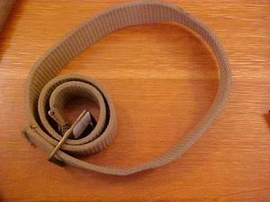 Tan belt with metal buckle