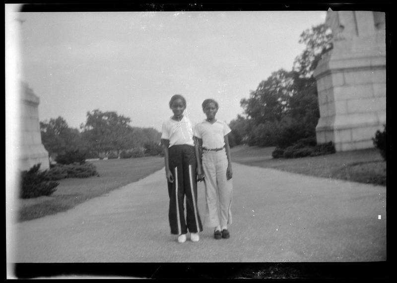 Two young people standing