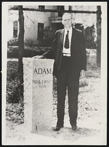 Monument to Adam. Chester, S.C. -- J. Foster Carter and the monument that he has erected to “Adam, The First Man”. As far as is known, this is the first monument that has been erected to Adam in the United States. Some years ago Robert Cuillan, writer, of Fountain Inn. S.C., erected a monument to Eve, and Mr. Carter thought that one should be erected to Adam. Mr. Carter placed the monument in his front yard near the highway.