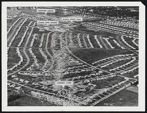 Ruskin Heights: Then The tornado's path of destruction through the residential heart of Ruskin Heights, Mo., is easily traced in this aerial photograph taken May 21, 1957, the day after the storm struck. "Ruskin Heights could have been framed and labeled 'Desolation,'" says Mrs. Earl F. Campbell, who rode out the storm in a cellar while her home was demolished. The twister rang up a death toll of 47 and destroyed 483 homes as well as Ruskin Senior and Junior High Schools and the area's shopping area.