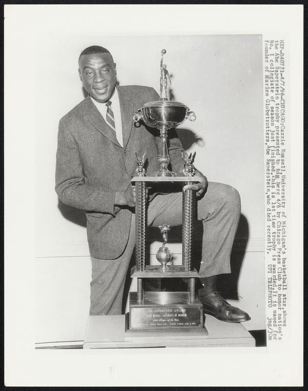 Cazzie Russell, University of Michigan’s basketball star, shows the Abe ...