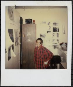 Young man posing and smiling