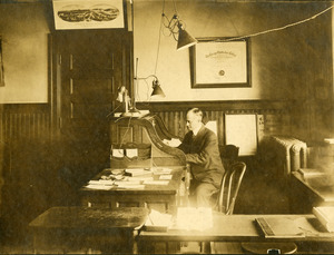 Charles Eugene Monroe in his second optometry office in Southbridge Massachusetts