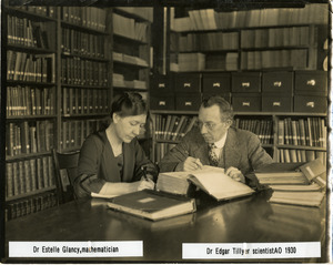 Dr. A. Estelle Glancy and Dr. Edgar D. Tillyer at work on a calculation, at the American Optical Southbridge
