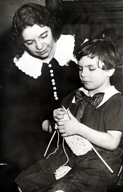 Helen Knitting with her Teacher