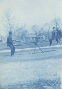 Thomas Stringer on Teeter Totter with Students