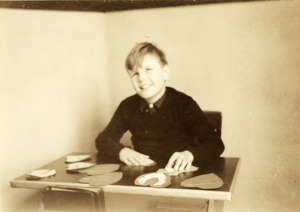 Leonard Dowdy seated with Paper Hearts