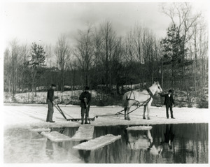 Ice cutting on Nine Mile Pond