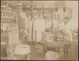 Workers in butcher shop