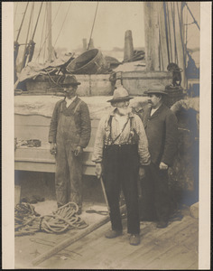 Frank Lewis and others on ship deck