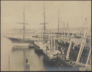Ships docked at wharf