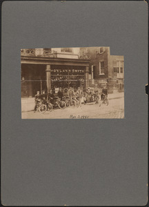 Shown in front of the building that now houses Post 1, American Legion, at Union and Sixth Streets, is a group of old time motorcyclists