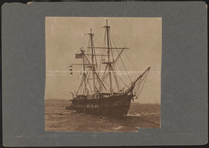 Almost at sea, the whaleship strikes a little white water in the wake of the cutter as she heads down-harbor for Mystic