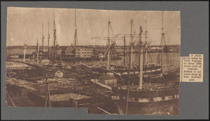 A photograph taken by Dick Topham in about 1890 shows craft of business docked at the waterfront in New Bedford port