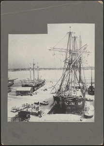 Whaling ships docked at wharf in New Bedford in winter