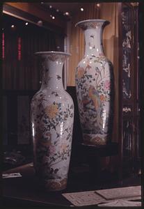 Two vases decorated with flowers and birds