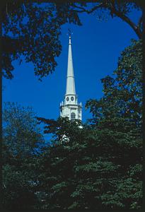 View of Old North Church steeple behind treetops, Boston