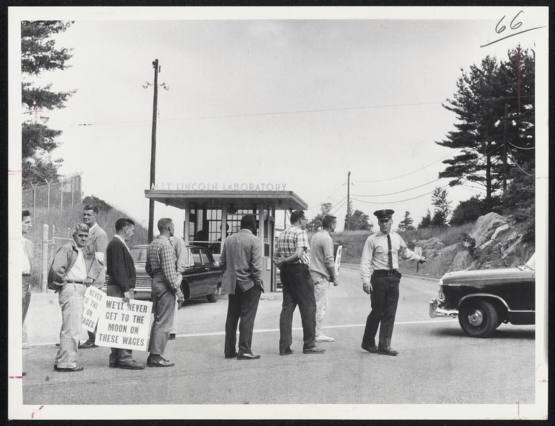 Pickets at MIT’s Lincoln Laboratory part to permit automobile strike=bound Lexington installation.