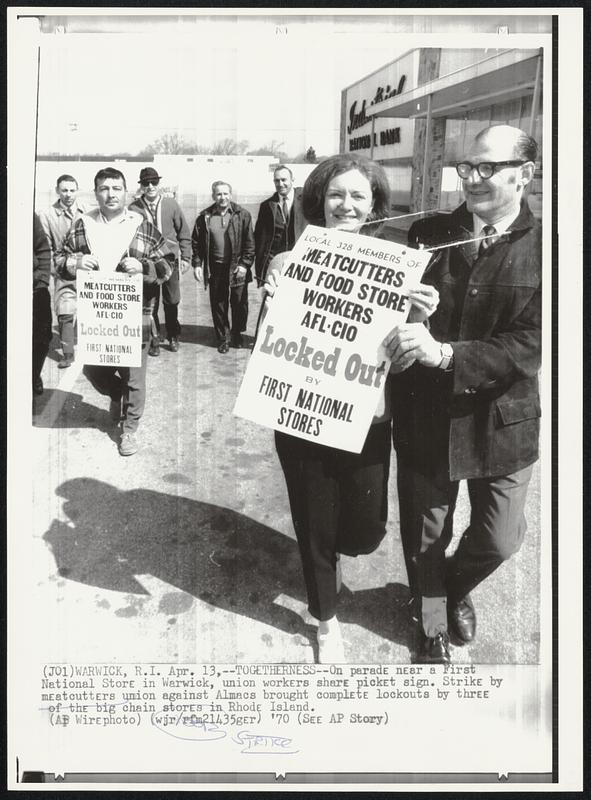 TogethernessOn parade near a First National Store in Warwick, union