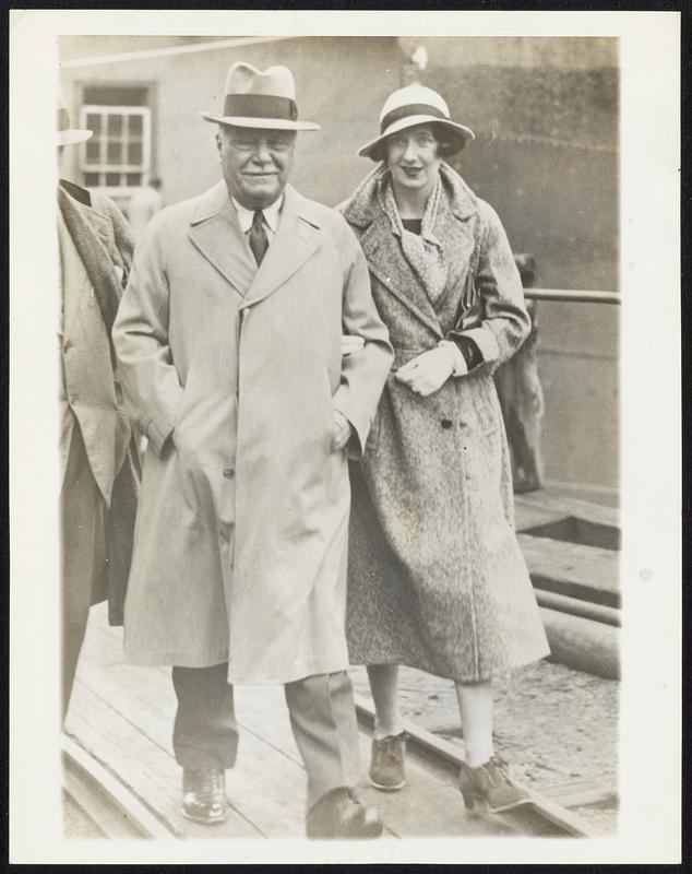 Ruppert Heiress and Benefactor Miss Helen Winthrope Weyant, former actress who was willed on third of the multi-milli estate of the late Col. Jacob Ruppert, is shown above with her benefactor at the time the ship "Jacob Ruppert" sailed from Bayonne, N.J. on Oct. 13, 1933 with the second Byrd Antarctic Expedition. The other two-thirds of the Ruppert Residuary Estate went to two nieces, Mrs. Joseph Holleran, of Greenwich, Conn., and Mrs. J. B. Maguire, also of Greenwich. The will was admitted to probate in New York, Jan. 20.