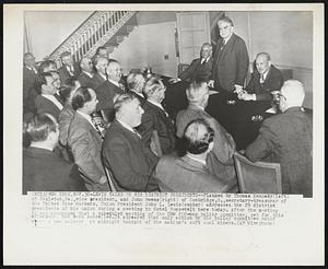 Lewis Talks to His District Presidents--Flanked by Thomas Kennedy (left) of Hazleton, Pa., vice president, and John Owens (right) of Cambridge, O., secretary-treasurer of the United Mine Workers, Union President John L. Lewis (center) addresses the 29 district presidents of his union during a meeting in Hotel Roosevelt here today. After the meeting it was announced that a scheduled meeting of the UMW 200-man policy committee, set for this afternoon, had been cancelled. It appeared that only action by the policy committee could alert a new walkout at midnight tonight of the nation's soft coal miners.