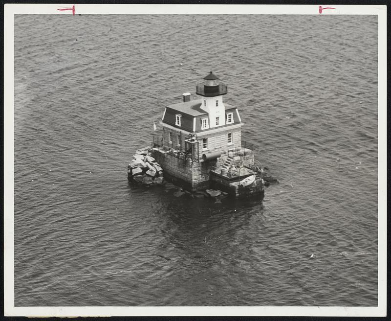 Water, Water Everywhere - Sabin Point Light, operated by two Coast Guardsmen, is on edge of a school in Providence river. Built in 1872, its light shines 12 miles. Coast Guardsmen see brighter lights every 24 days, when they get six-day leave.