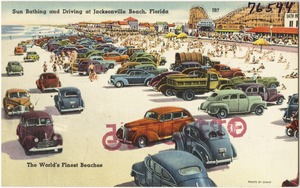 Sun bathing and driving at Jacksonville Beach, Florida