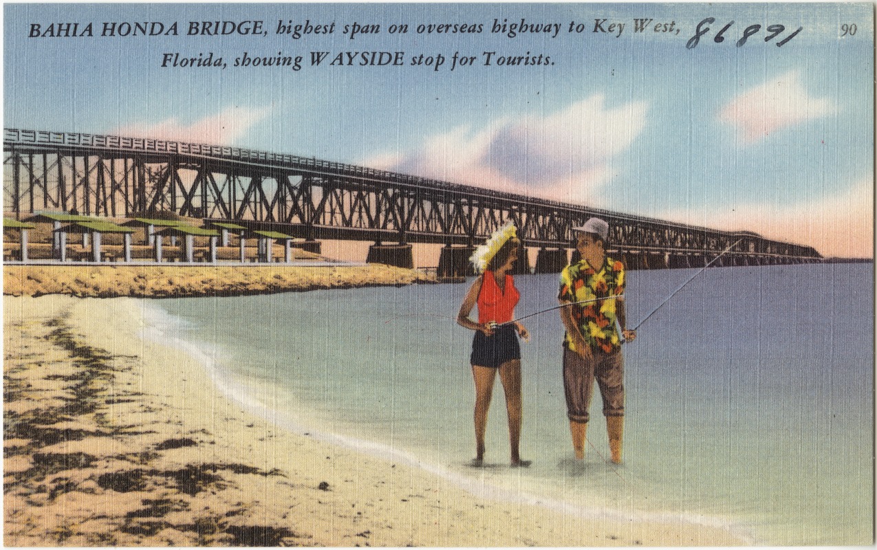 Bahia Honda Bridge, highest span on Overseas Highway to Key West, Florida, showing wayside stop for tourists.