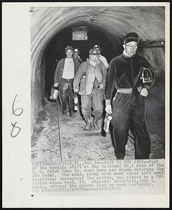 Back to the Pits--Part of the morning shifts at the National No. 1 mine of the H. C. Frick Coke Co. near here are shown entering the pit today. The mine, along with most other soft coal operations throughout the nation, was closed by a UMW strike since Sept. 19. Diggers' chieftain, John L. Lewis, ordered the miners back to work yesterday.