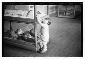 Girl looking at exhibits, Museum of Fine Arts