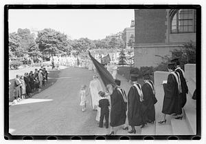 Religious procession leaving Eisner Administration building, Emmanuel College
