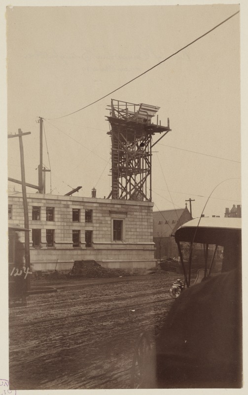 Mock-up of cornice on scaffolding, construction of the McKim Building.