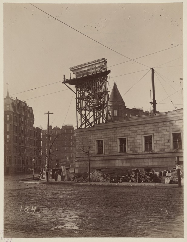 Mock-up of cornice on scaffolding, construction of the McKim Building.