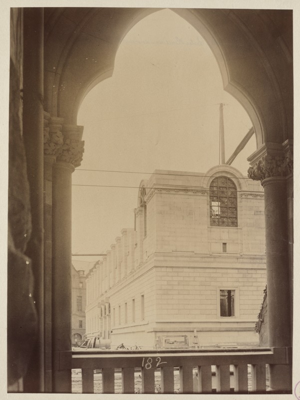 View of Dartmouth and Boylston St. corner, showing Bates Hall window with grill work, construction of the McKim Building