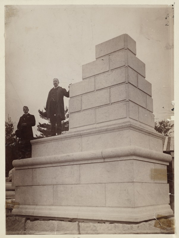Members of the Trustees of the Boston Public Library and Boston City Council pose with mock-up of cornerstone for McKim Building assembled at the Milford Quarry