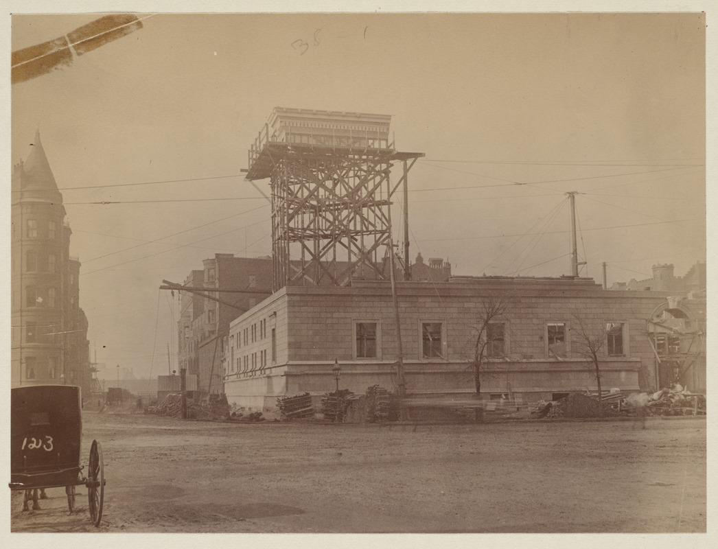 Mock-up of cornice on scaffolding, construction of the McKim Building.