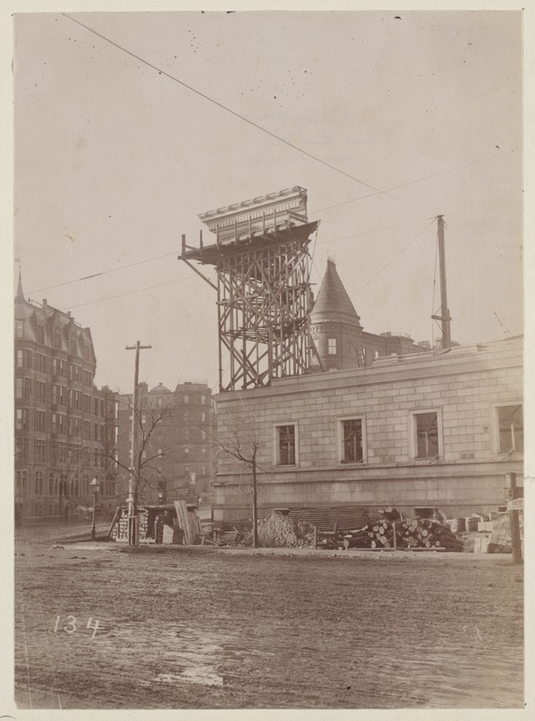 Mock-up of cornice on scaffolding, construction of the McKim Building.