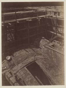 View of arches underneath Grand Staircase, construction of the McKim Building