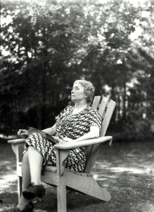 Helen Keller Reading Outside