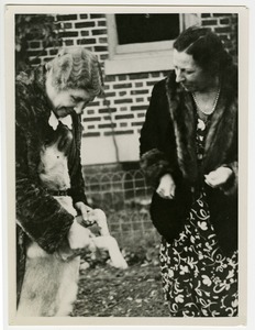 Helen Keller and Polly Thomson Playing with Kamikaze