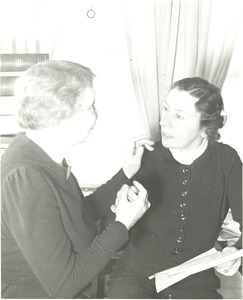 Helen Keller and Polly Thomson conversing